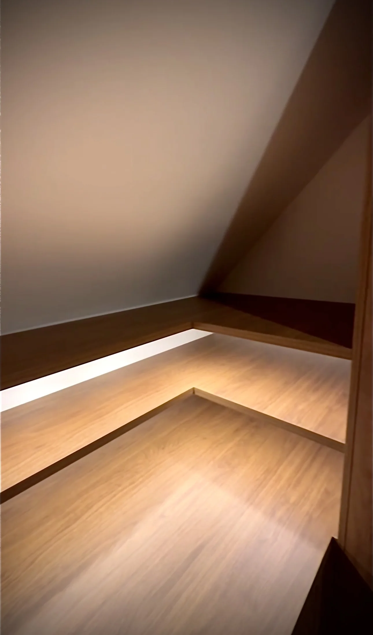 Integrated shadow-gap lighting detail in timber joinery